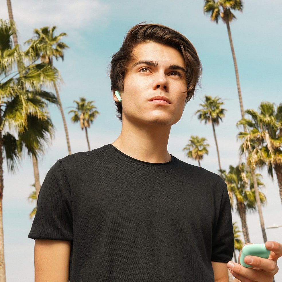 image of customer using YAJ Earbuds